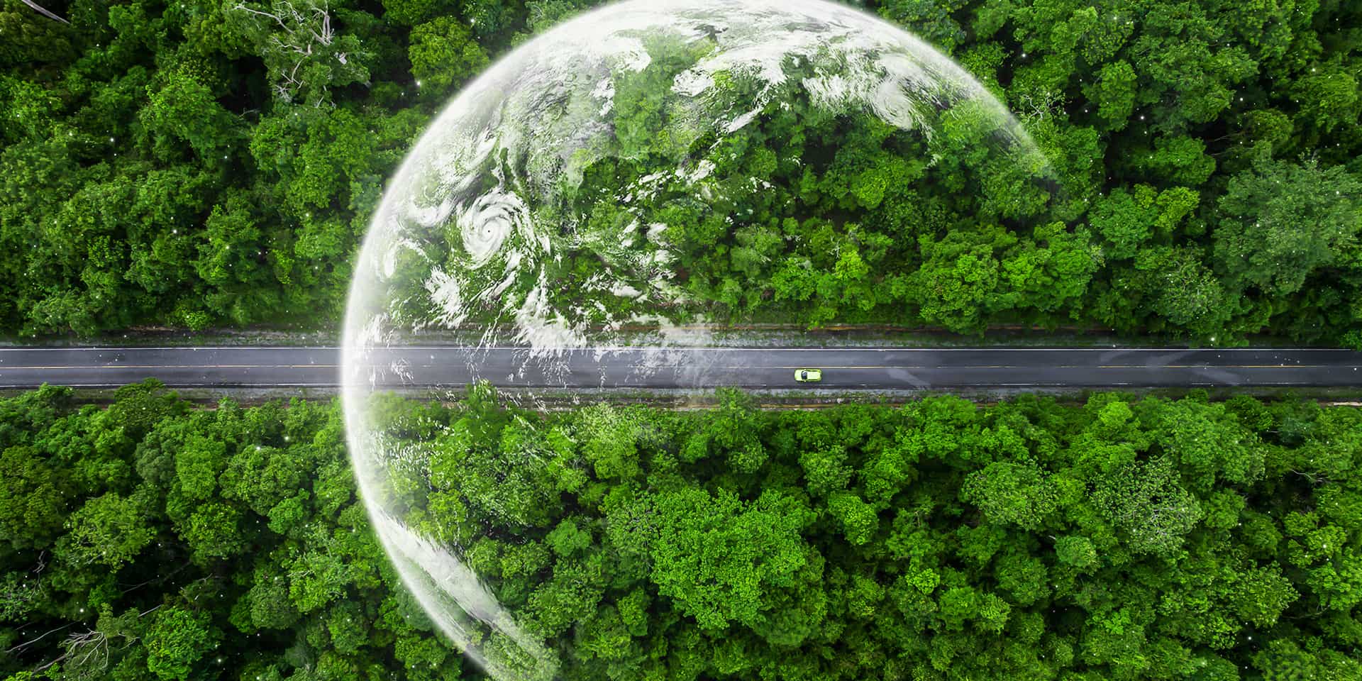 Planet Earth nestled in a green forest with a road running through it